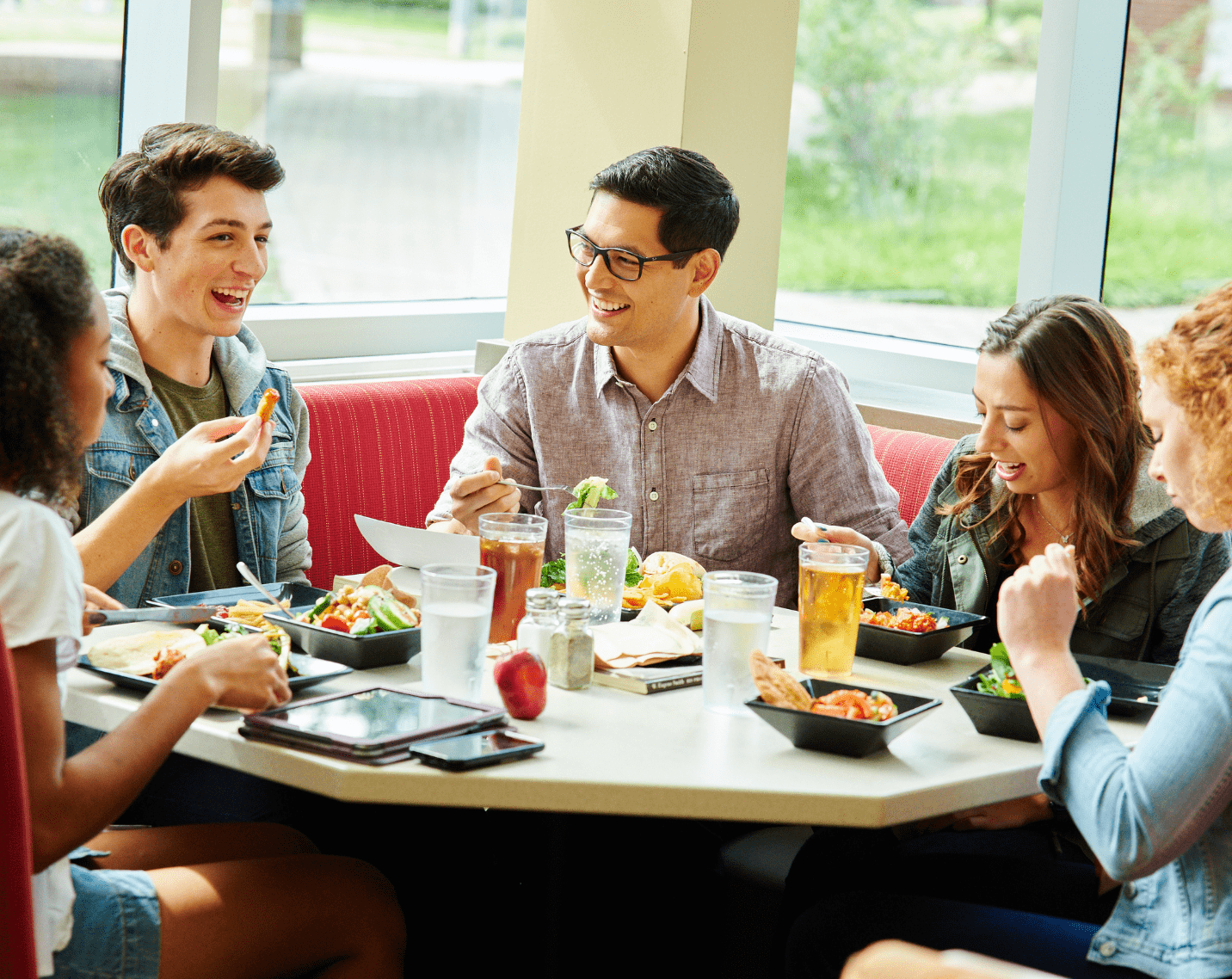 Students at a table. 